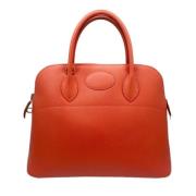 Pre-owned Leather handbags Hermès Vintage , Red , Dames