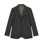 Donkergrijze wollen blazer met elleboogstukken in regular fit. Brooks ...