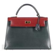 Pre-owned Leather handbags Hermès Vintage , Black , Dames