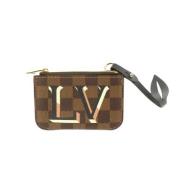 Tweedehands portemonnees Louis Vuitton Vintage , Brown , Dames