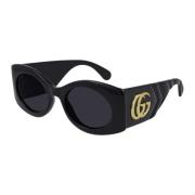 Zwarte ovale zonnebril met matelassé-tempel Gucci , Black , Dames