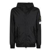 Zwarte Nylon Jas met Rits en Klassieke Capuchon Stone Island , Black ,...