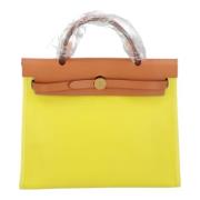 Pre-owned Leather handbags Hermès Vintage , Yellow , Dames