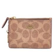 Pre-owned Coated canvas wallets Coach Pre-owned , Brown , Dames