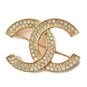 Pre-owned Metal brooches Chanel Vintage , Yellow , Dames