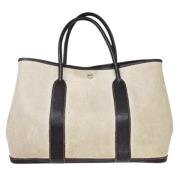 Pre-owned Canvas handbags Hermès Vintage , Beige , Dames
