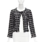 Pre-owned Nylon outerwear Chanel Vintage , Black , Dames