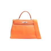 Pre-owned Leather crossbody-bags Hermès Vintage , Orange , Dames