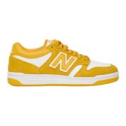 Gouden platte sneakers geïnspireerd door basketbal New Balance , Yello...