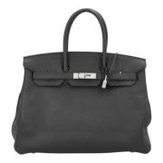 Pre-owned Leather handbags Hermès Vintage , Black , Dames