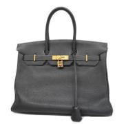 Pre-owned Leather handbags Hermès Vintage , Black , Dames