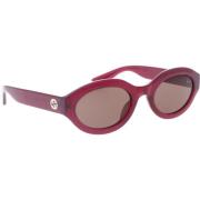 Stijlvolle zonnebril met uniek ontwerp Gucci , Purple , Dames