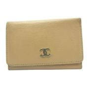 Pre-owned Leather wallets Chanel Vintage , Beige , Unisex