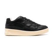 Verhoog je sneaker game met deze strakke zwarte sneakers Jil Sander , ...