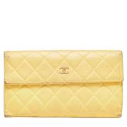 Pre-owned Leather wallets Chanel Vintage , Yellow , Dames