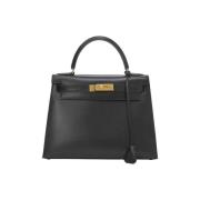 Pre-owned Leather handbags Hermès Vintage , Black , Dames