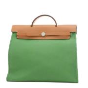 Pre-owned Canvas handbags Hermès Vintage , Green , Dames