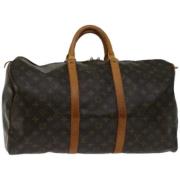 Pre-owned Canvas handbags Louis Vuitton Vintage , Brown , Dames