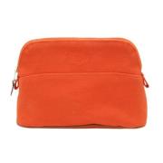 Pre-owned Cotton clutches Hermès Vintage , Orange , Dames