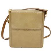 Pre-owned Leather clutches Louis Vuitton Vintage , Beige , Dames