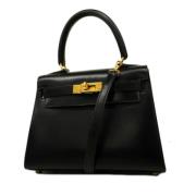 Pre-owned Leather handbags Hermès Vintage , Black , Dames