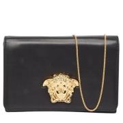 Pre-owned Leather clutches Versace Pre-owned , Black , Dames