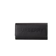 Zwarte portemonnee van generfd leer met logoprint Burberry , Black , D...