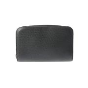 Pre-owned Leather clutches Louis Vuitton Vintage , Black , Heren