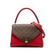 Pre-owned Leather handbags Louis Vuitton Vintage , Red , Dames