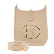 Pre-owned Fabric shoulder-bags Hermès Vintage , Beige , Dames