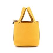 Pre-owned Fabric handbags Hermès Vintage , Yellow , Dames