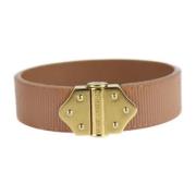 Pre-owned Metal bracelets Louis Vuitton Vintage , Beige , Dames