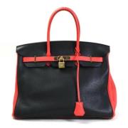 Pre-owned Fabric handbags Hermès Vintage , Black , Dames