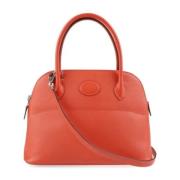 Pre-owned Fabric handbags Hermès Vintage , Orange , Dames