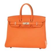 Pre-owned Fabric handbags Hermès Vintage , Orange , Dames