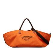 Pre-owned Canvas shoulder-bags Hermès Vintage , Orange , Dames