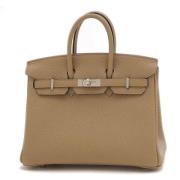 Pre-owned Fabric handbags Hermès Vintage , Beige , Dames