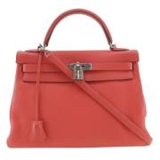 Pre-owned Fabric handbags Hermès Vintage , Red , Dames