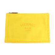 Pre-owned Fabric pouches Hermès Vintage , Yellow , Dames