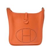 Pre-owned Fabric shoulder-bags Hermès Vintage , Orange , Dames