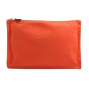 Pre-owned Fabric pouches Hermès Vintage , Orange , Dames