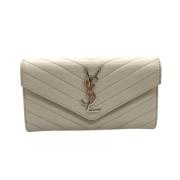 Pre-owned Leather wallets Yves Saint Laurent Vintage , Beige , Dames