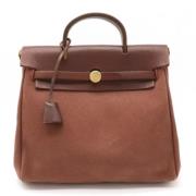 Pre-owned Leather backpacks Hermès Vintage , Brown , Dames