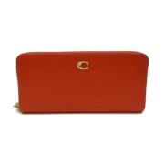 Pre-owned Leather wallets Coach Pre-owned , Orange , Dames