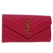 Pre-owned Leather wallets Yves Saint Laurent Vintage , Pink , Dames