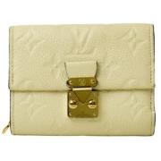 Pre-owned Canvas wallets Louis Vuitton Vintage , Beige , Dames