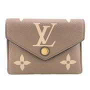 Pre-owned Leather wallets Louis Vuitton Vintage , Beige , Dames