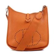 Pre-owned Leather shoulder-bags Hermès Vintage , Orange , Dames