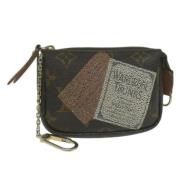 Pre-owned Canvas pouches Louis Vuitton Vintage , Brown , Dames