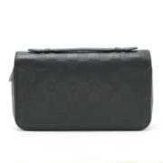 Pre-owned Fabric clutches Louis Vuitton Vintage , Black , Dames